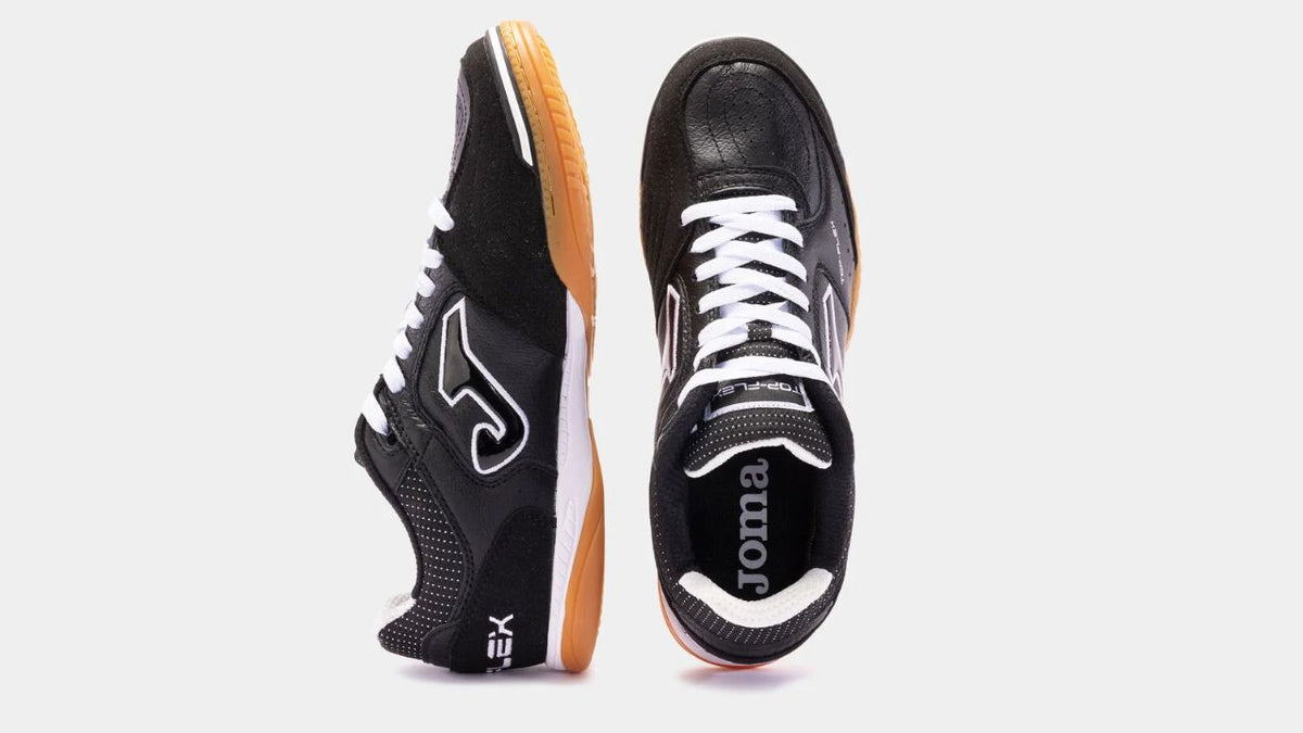 Joma futsal shoes on a white background